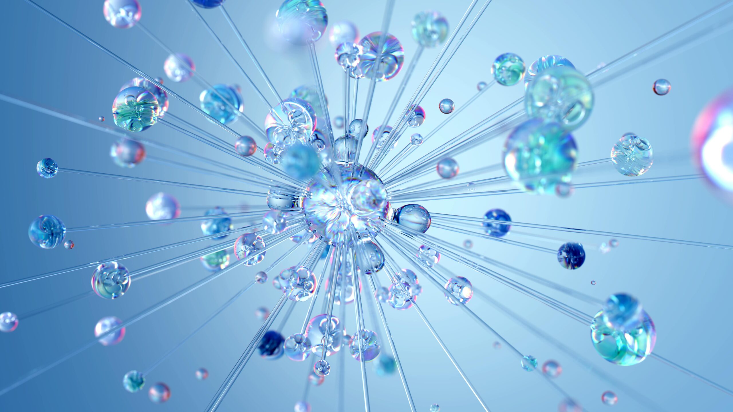 abstract image of blue-tinted water droplets forming sputnik-like shape